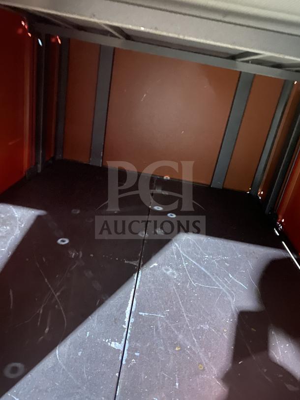 Izzo Forni red electric dome-style pizza oven interior, commercial-grade, with minor scratches visible.