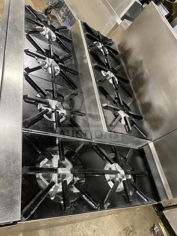 Jade Range commercial 8-burner stainless steel gas range, model TRLH-02S-T-48, with chef base, back splash, and double back guard.