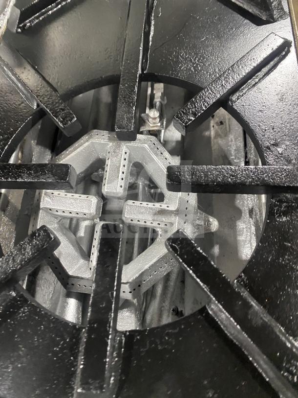 Jade Range 8-burner stainless steel range, model TRLH-02S-T-48, natural gas, with backsplash and flue riser.