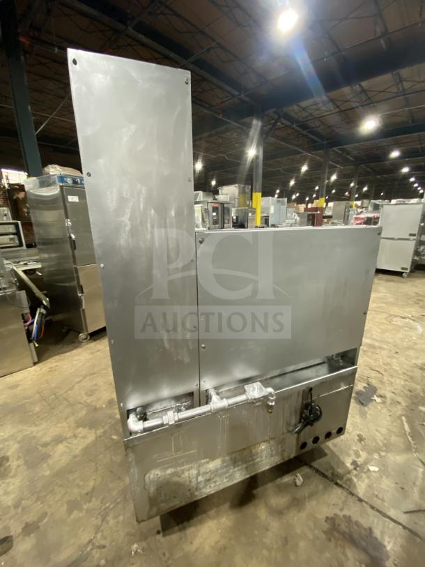 Jade Range commercial stainless steel 8-burner gas range with 2-drawer chef base, back splash, and flue riser, model TRLH-02S-T-48.