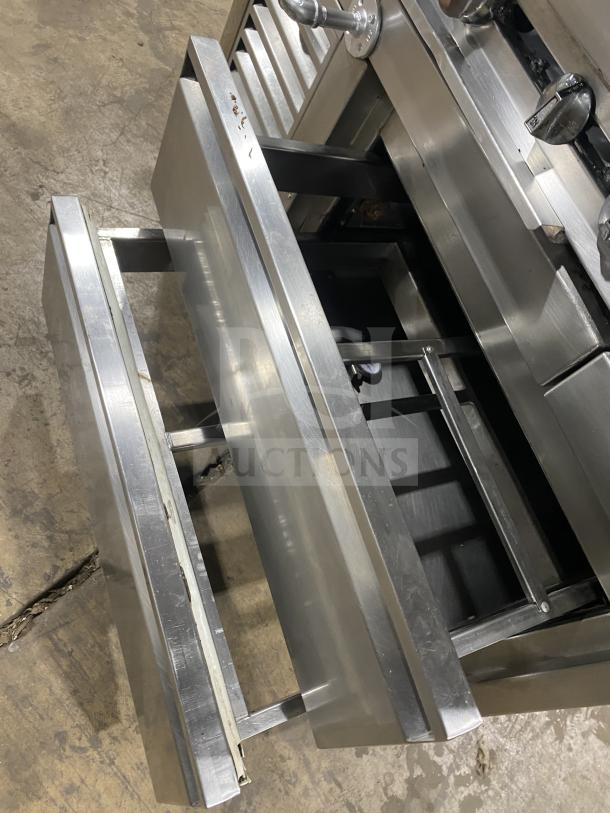 Jade Range stainless steel 8-burner range with 2-drawer chef base, back splash, double back guard, model TRLH-02S-T-48.