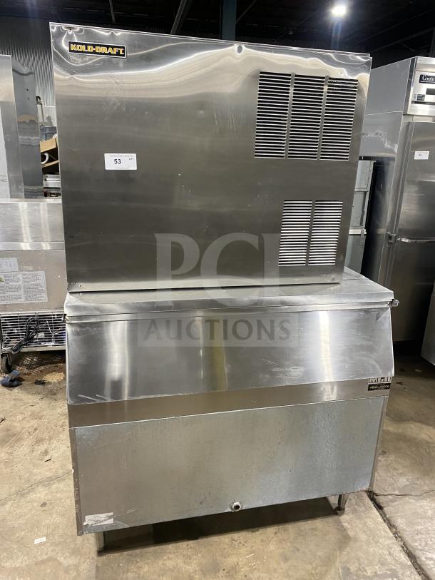 Kold Draft commercial stainless steel ice making machine on bin, Model C81064LC, 208/230V, good condition, on legs.