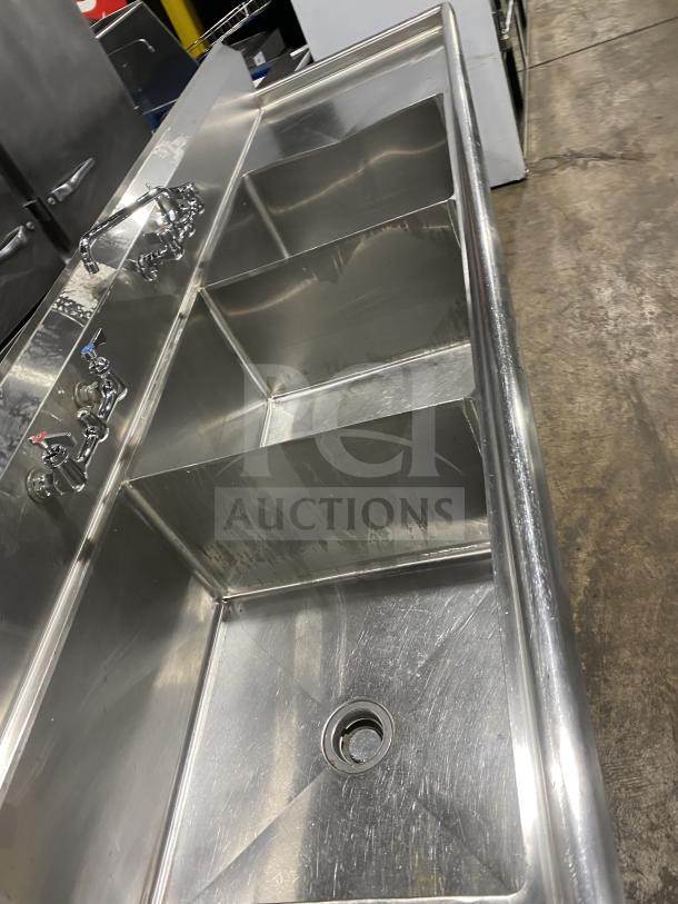KCS commercial stainless steel 3-compartment sink, on legs. Features durable construction, separate faucets, clean condition.