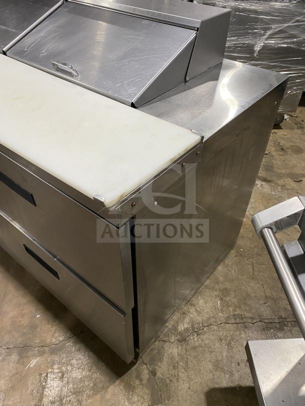 Delfield Manitowoc stainless steel 4-drawer prep table, model UCD4464N-12-DD5, with mega top, good condition.