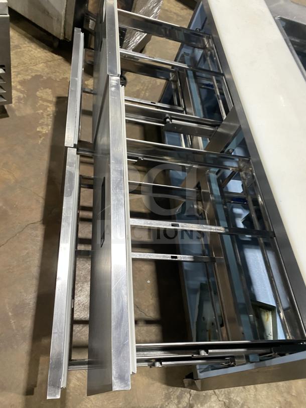 Delfield Manitowoc UCD4464N-12-DD5 stainless steel 4-drawer refrigerated prep table; commercial use, good condition.