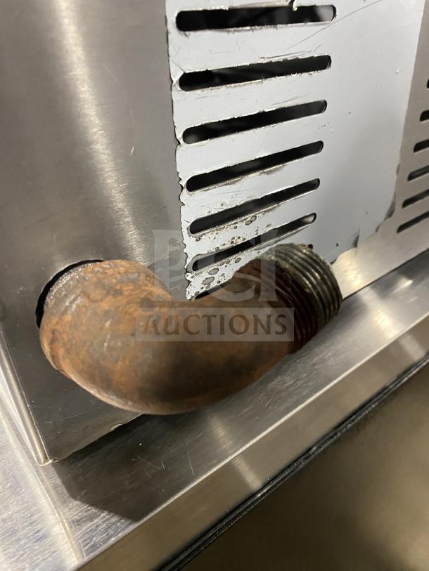 L&J Bunn SH SERVER stainless steel 4-burner countertop hot plate, model SH SERVER, showing rusted pipe and vent details.