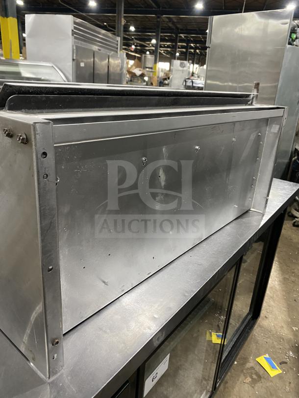 American Range commercial stainless steel salamander broiler in industrial setting. Features durable metal construction.