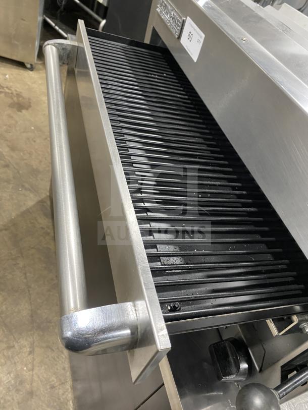 American Range commercial stainless steel salamander broiler, features heavy-duty materials, in used condition, auction tag visible.