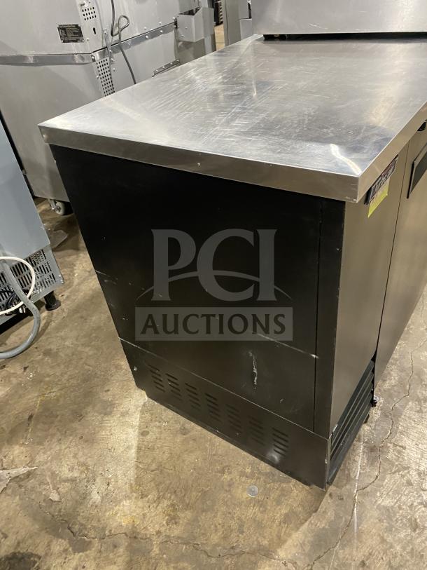 Turbo Air TBB-2SB Black 2-Door Bar Cooler, stainless steel worktop, poly coated rack, on casters, 110/120V, commercial use.