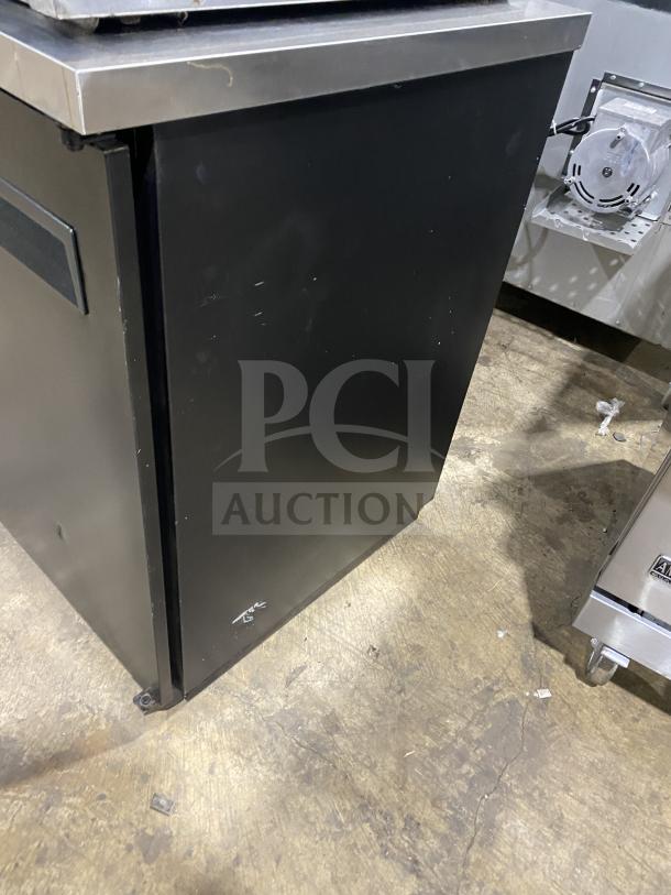 Turbo Air TBB-2SB commercial black 2-door bar back cooler with stainless steel worktop, poly-coated wired rack, on casters.