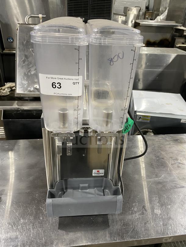 Crathco Classic Bubbler Series twin beverage dispenser, model CS-2E/1D-16, with clear hoppers, double drip trays, and stainless steel body.