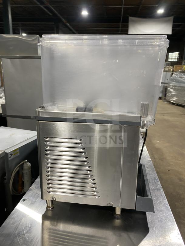 Crathco Classic Bubbler Series refrigerated beverage dispenser, model CS-2E/1D-16, stainless steel, clear hoppers, on legs.