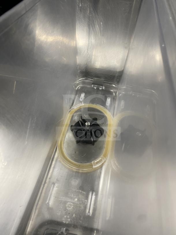 Crathco Classic Bubbler Series, Model CS-2E/1D-16. Clear hopper interior. Commercial stainless steel beverage dispenser.