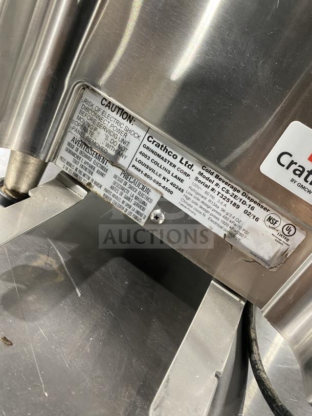 Crathco Classic Bubbler Series twin beverage dispenser, model CS-2E/1D-16, stainless steel, with clear hoppers and double drip trays. Serial number T325189.