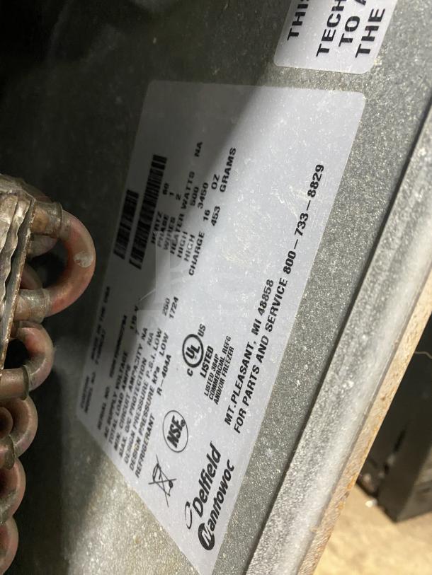 Delfield stainless steel 1-door refrigerated prep table, mega top, enclosed storage, visible NSF and UL labels, good condition.