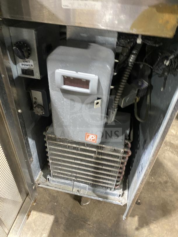 Delfield commercial stainless steel 1-door refrigerated prep table, mega top with enclosed storage, in good condition.