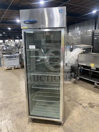 Hoshizaki commercial refrigerator, model CR1B-FGYCR, with glass door, stainless steel frame, poly-coated racks, on casters.