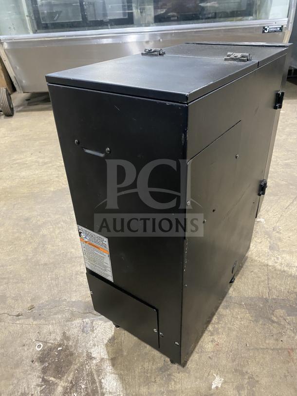 Bunn FMD DBC-3 dispenser, black, single hopper, on legs, visible condition: good, 120V 1 Phase, side label with specs.