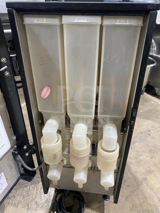 Bunn FMD DBC-3 dispenser machine, 120V, single hopper, countertop model, on legs, used condition, interior view displayed.