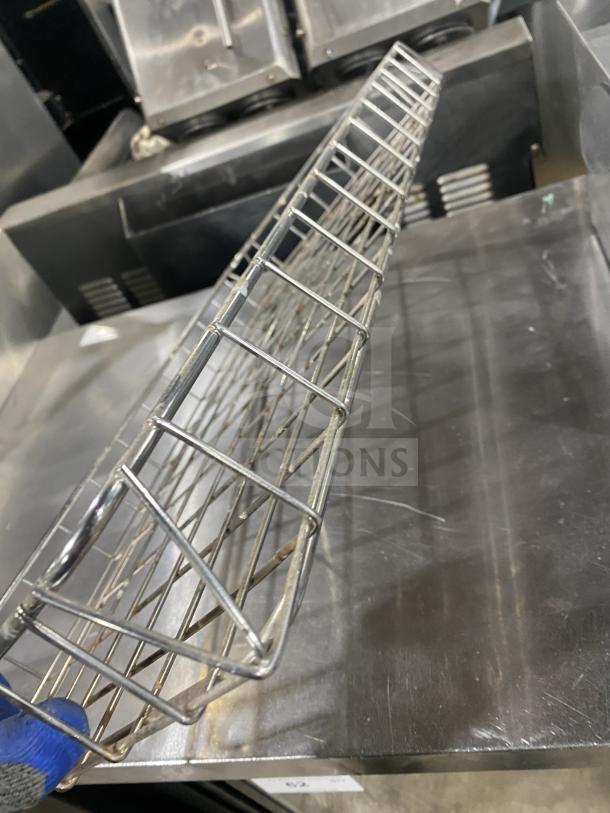 Commercial stainless steel bagel wraps, sturdy wire construction, excellent condition, ideal for food service use.