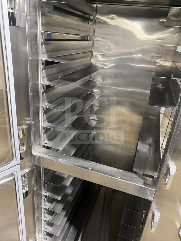 Traulsen RHT232WUTHHS stainless steel reach-in refrigerator with 4 split doors and built-in pan racks. Model RHT232WUT-HHS.