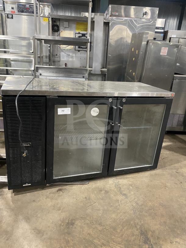 Perlick BS2DP commercial stainless steel countertop back bar refrigerator with double glass doors, black finish, and shelf rack.