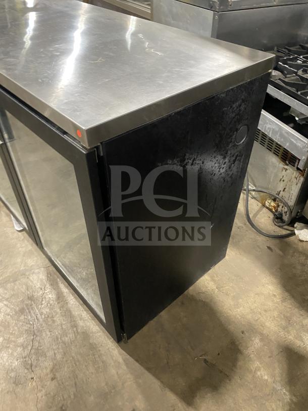 Perlick BS2DP black double glass door back bar refrigerator, stainless steel countertop, electric, with rack, 115V, used.