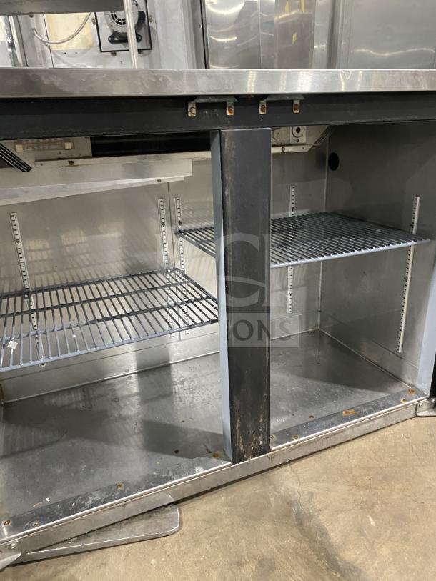 Perlick Model BS2DP stainless steel countertop back bar refrigerator with double glass doors, black trim, racks included.