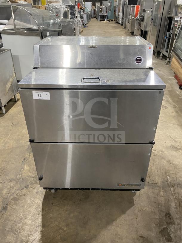 True Commercial Stainless Steel Single-Sided Mobile Milk Cooler, Model TMCX-34-S, 115V, in good condition.