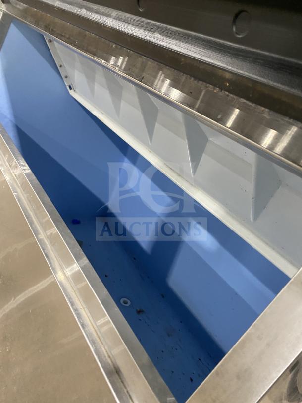 Hoshizaki KM1301SAH3 stainless steel ice maker and bin combo, air-cooled, visible interior, model C00446J, 108-230V, on legs.