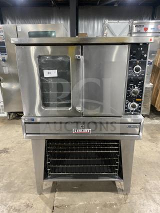Garland Summit Series stainless steel convection oven, model TE4CH, with thermostatic controls, pan and wired oven rack, on legs.