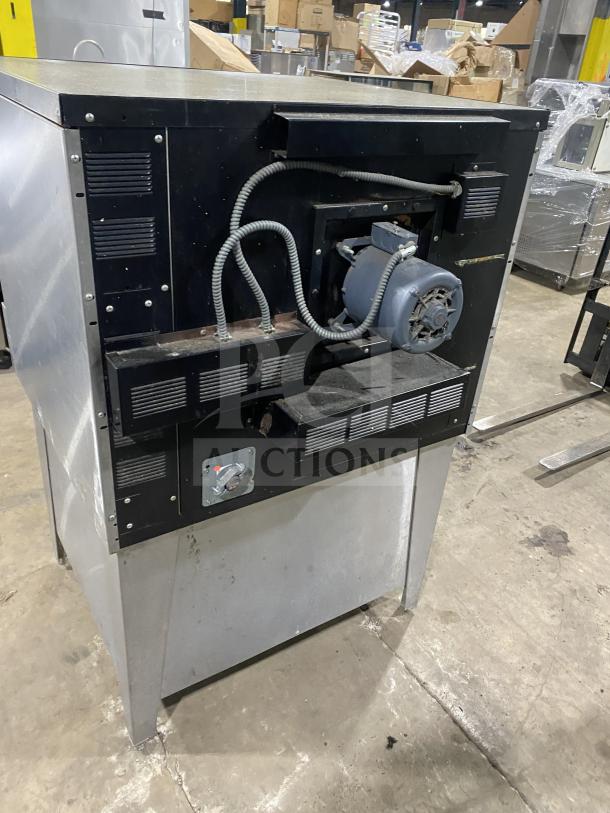 Garland Summit Series stainless steel convection oven, model TE4CH, with thermostatic controls and pan rack, 208V, on legs.