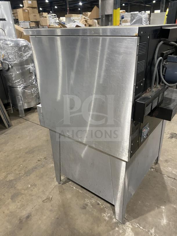 Garland Summit Series stainless steel convection oven, model TE4CH, on legs, featuring thermostatic controls and pan rack.