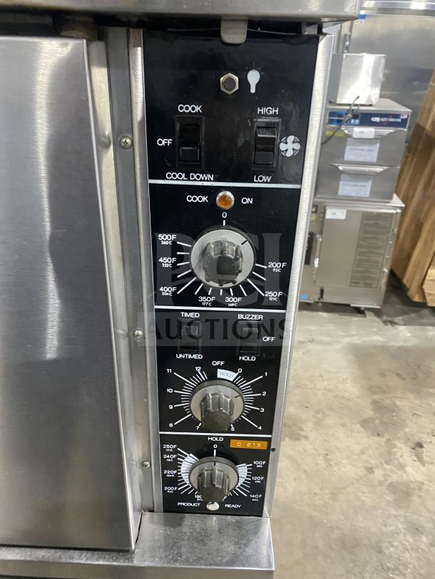Garland TE4CH commercial convection oven with thermostatic controls and pan rack, stainless steel, on legs, SN: 219185 H07.