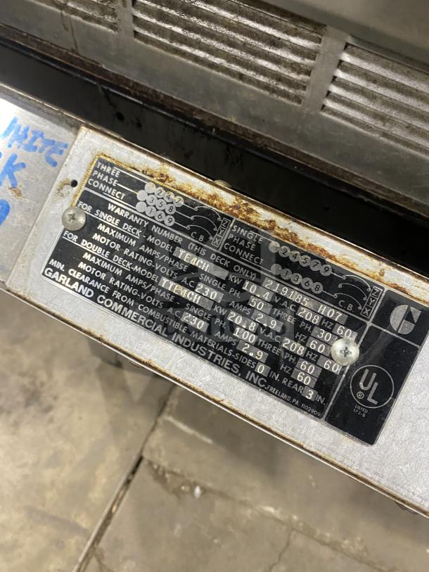 Garland Summit Series stainless steel convection oven, model TE4CH, with thermostatic controls and wired oven rack.