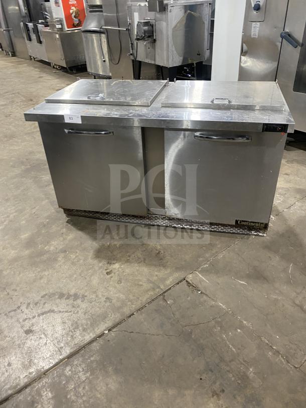 Continental SW601N24M stainless steel refrigerated salad prep table with two doors, poly coated rack, on casters.