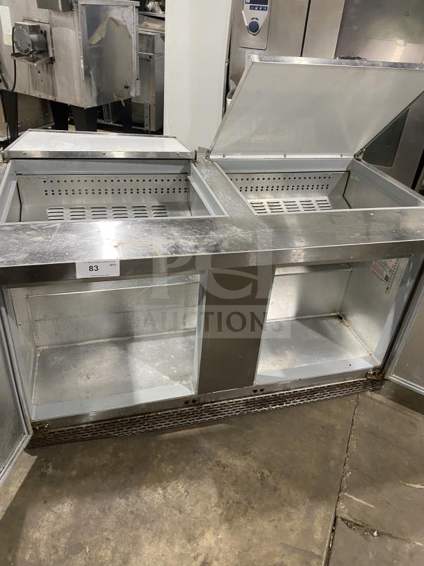 Continental SW601N24M refrigerated prep table, 2-door, stainless steel, poly-coated rack, on casters, model SN 159B8977.
