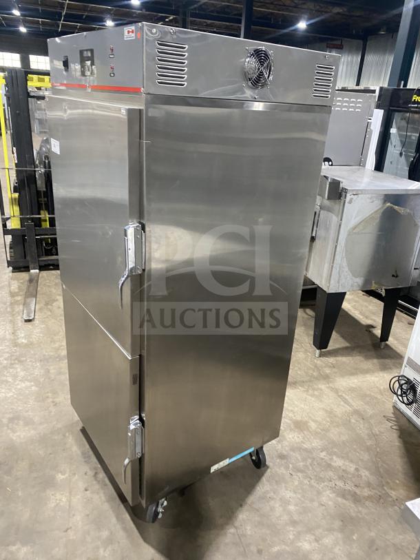 Carter-Hoffman stainless steel 2-door heated holding cabinet, Model 27080-2129, on casters, good condition, 240V.