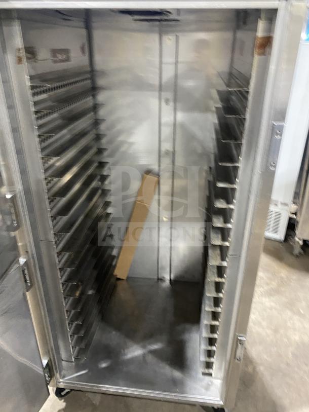 Carter-Hoffman stainless steel 2-door heated holding cabinet, Model 27080-2129, SN 318990, on casters, for sheet pans.