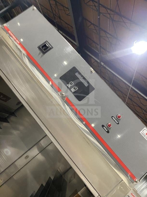 Carter-Hoffman stainless steel 2-door heated cabinet, Model 270802129, with controls panel, on casters, 240V, clean condition.