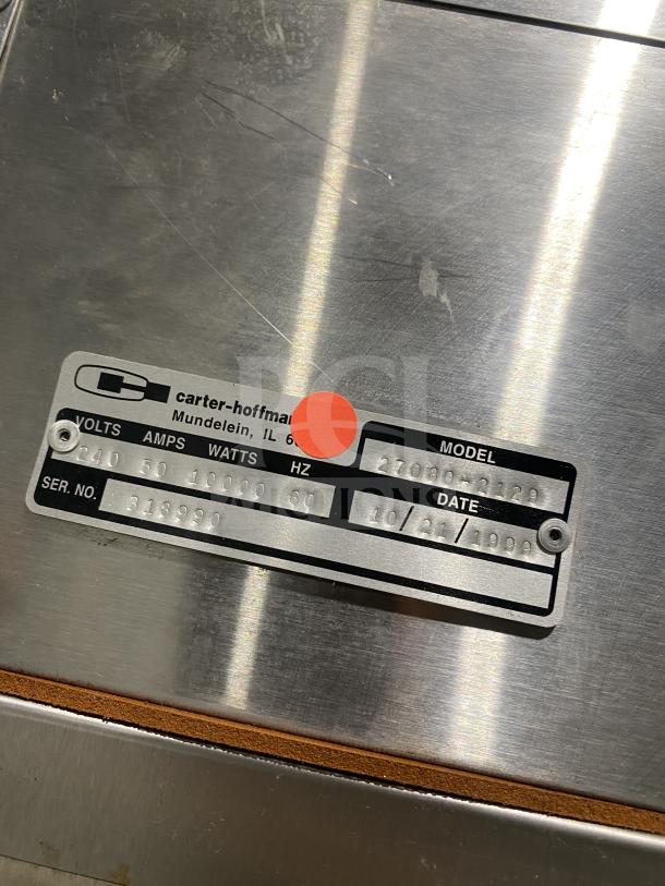 Carter-Hoffman stainless steel 2-door heated holding cabinet, model 27080-2129, on casters. Serial No. 318990, 240V.