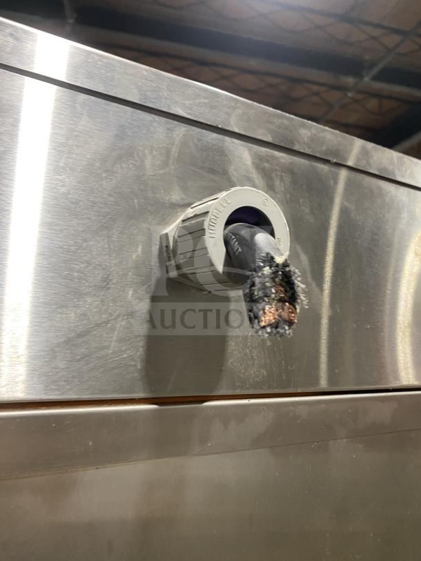 Carter-Hoffman stainless steel 2-door heated cabinet, Model 27080-2129, SN: 318990, with damaged power cable visible.