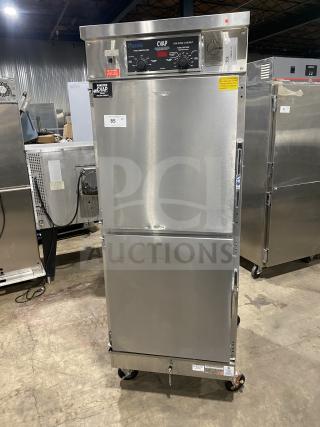 Winston Industries Cvap-4000A stainless steel heated holding cabinet, model HA4522GE, with pass-through doors and pan racks.