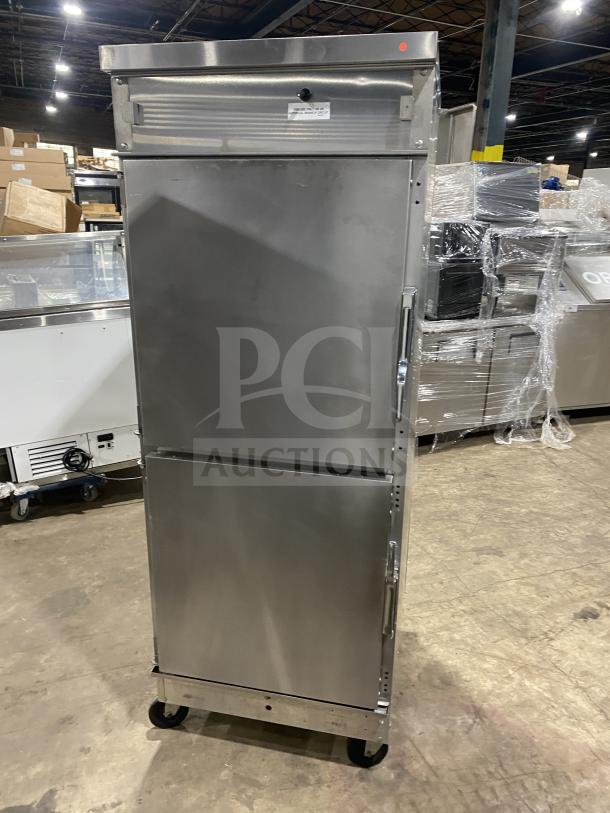Winston Industries Cvap-4000A heated holding cabinet, stainless steel, half doors, model HA4522GE, on casters.