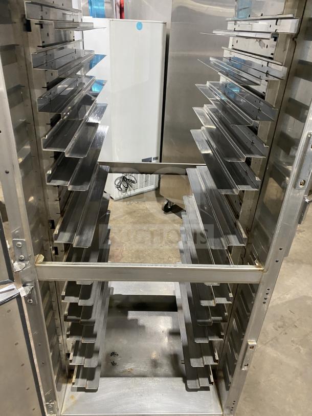 Winston Cvap-4000A commercial heated holding cabinet, model HA4522GE, stainless steel, pass-through doors, pan racks, on casters.