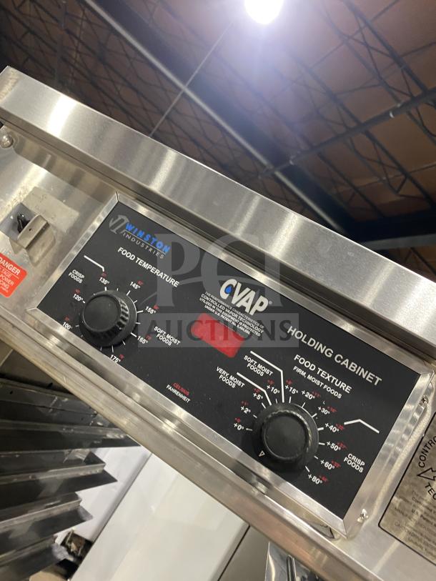 Winston Industries Cvap-4000A Series heated holding cabinet, model HA4522GE, stainless steel, 120V, with pass-through doors and pan racks.