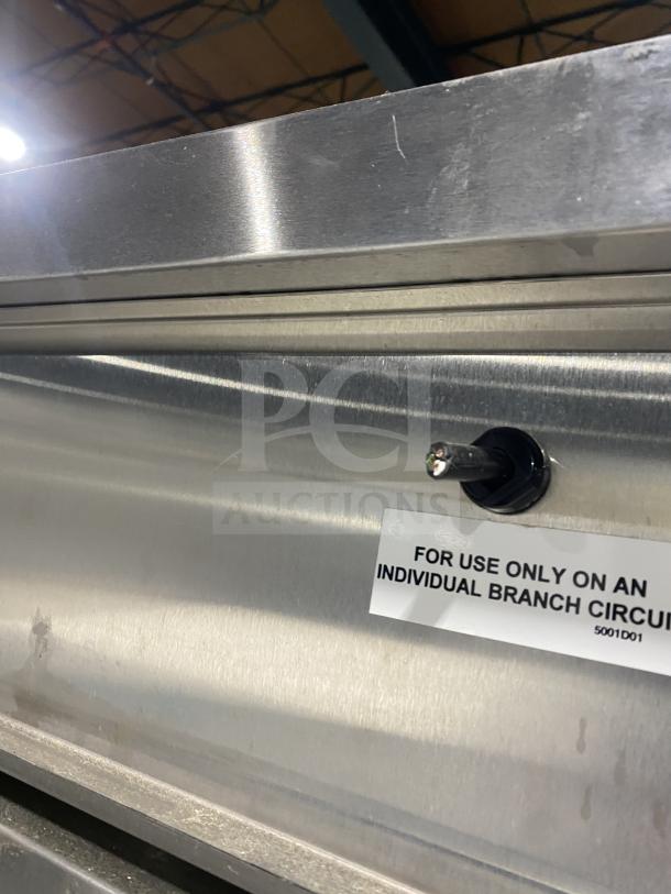 Winston Industries Cvap-4000A Series stainless steel heated holding cabinet, model HA4522GE, with pass-through doors and pan racks.