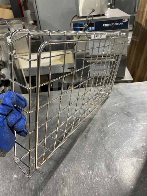 Commercial stainless steel rack for bagel wraps, grid design, clean condition. Ideal for bakery display or storage use.