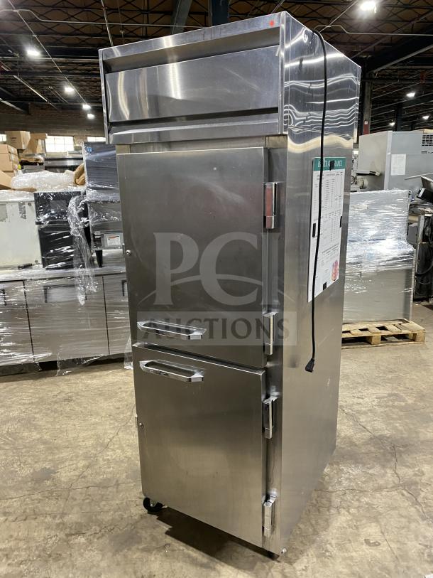 Continental Commercial 2-Door Stainless Steel Refrigerator, Model 1RE-PT-HD, on casters, includes rack and shelf, good condition.