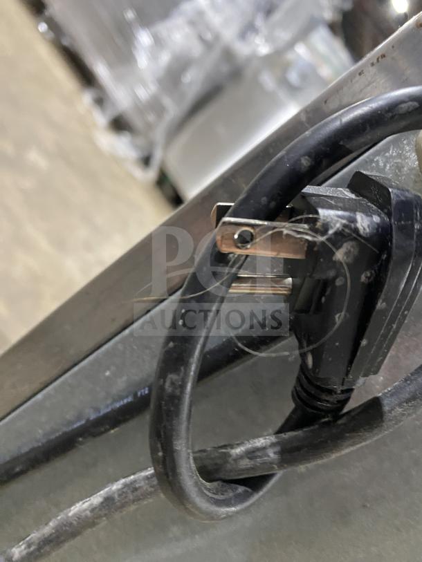 Close-up of Victory Commercial Refrigerator cable and plug, model RSA-1D-S7, SN: G1085511, 115V, 1 Phase.